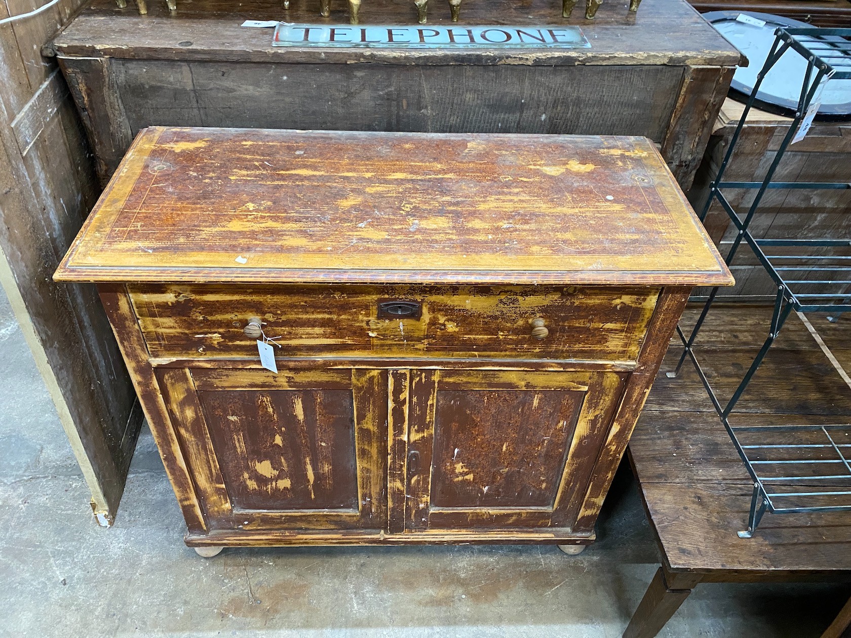 A 19th century East European painted pine side cabinet, width 108cm, depth 47cm, height 96cm